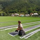 Počelo postavljanje umjetne trave na novo nogometno igralište u ŠRC Podgora